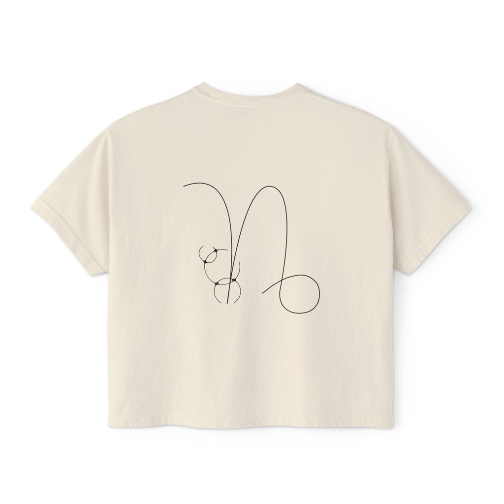 Back view of a Beige t-shirt featuring a minimalist Capricorn zodiac design in orbital line-art
