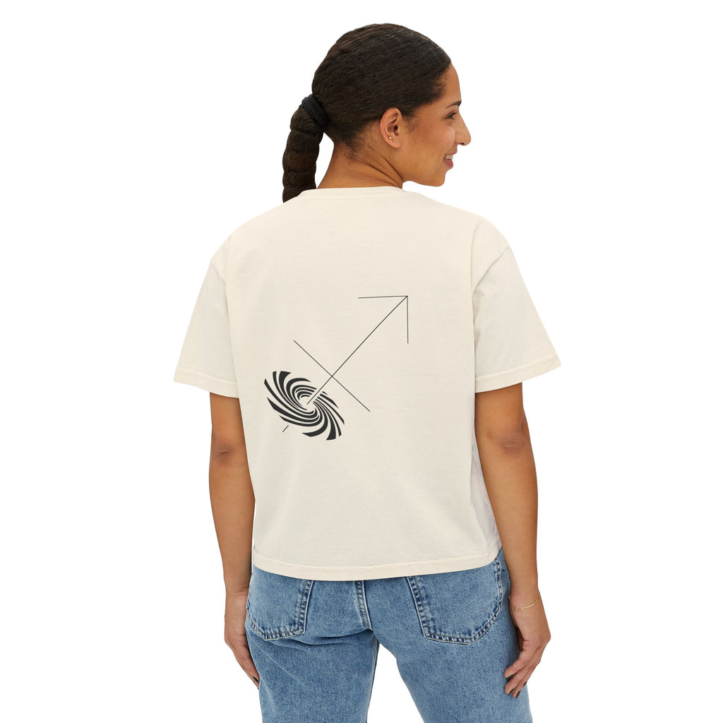 Person wearing a Beige t-shirt with a minimalist Sagittarius zodiac design in orbital line-art in the back