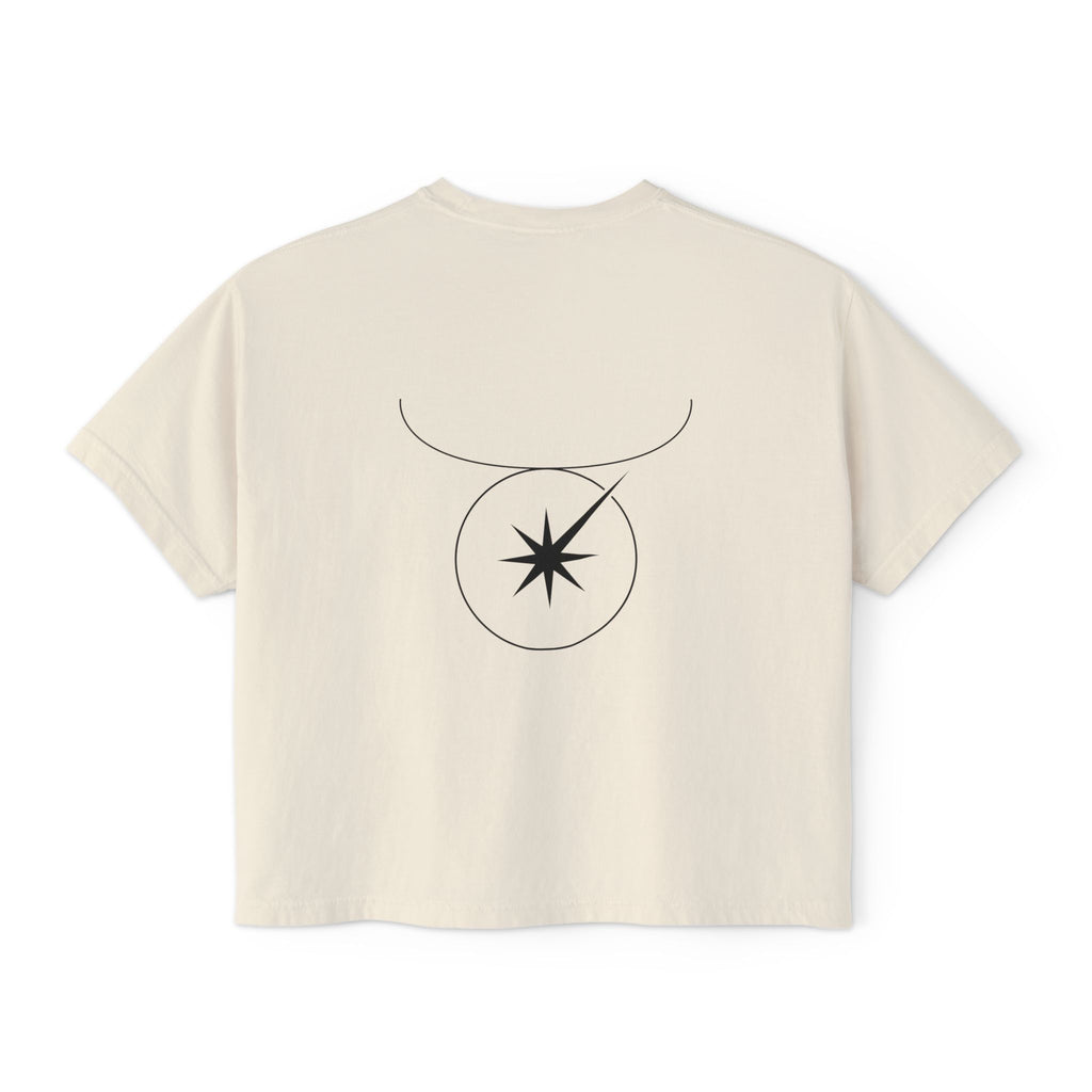 Back view of a Beige t-shirt featuring a minimalist Taurus zodiac design in orbital line-art