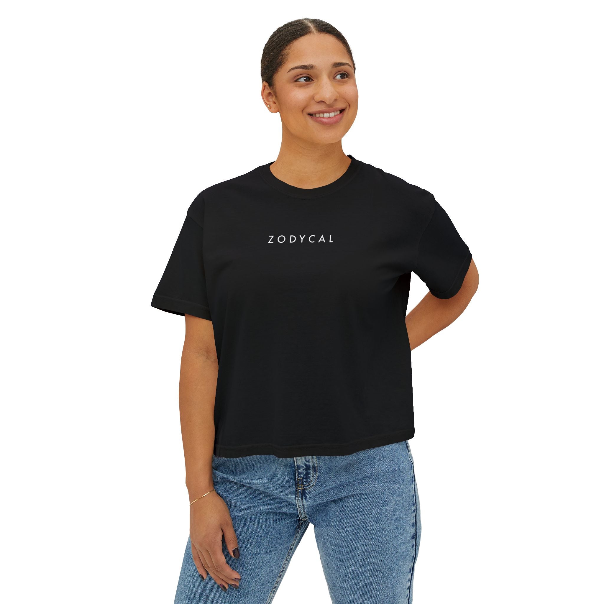 Woman wearing a Black t-shirt with a minimalist Zodycal brand design