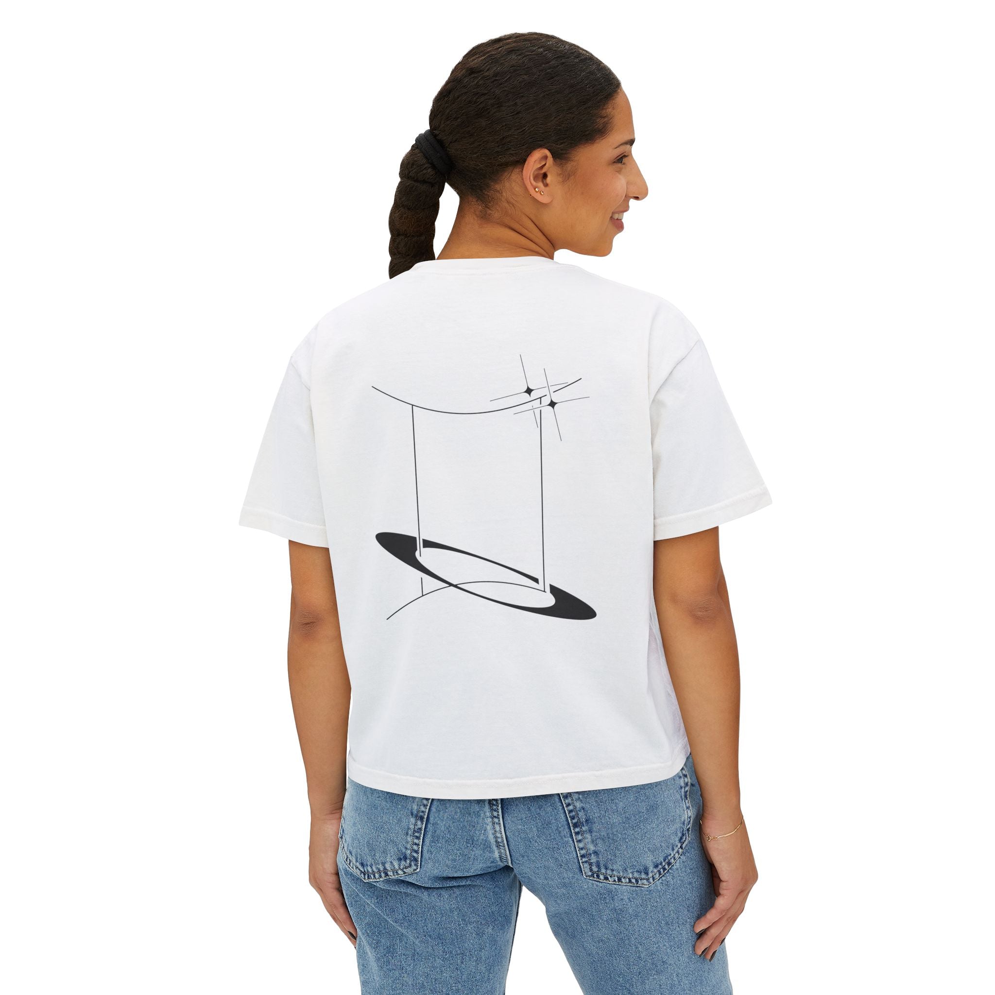 Person wearing a white t-shirt with a minimalist Gemini zodiac design in orbital line-art in the back